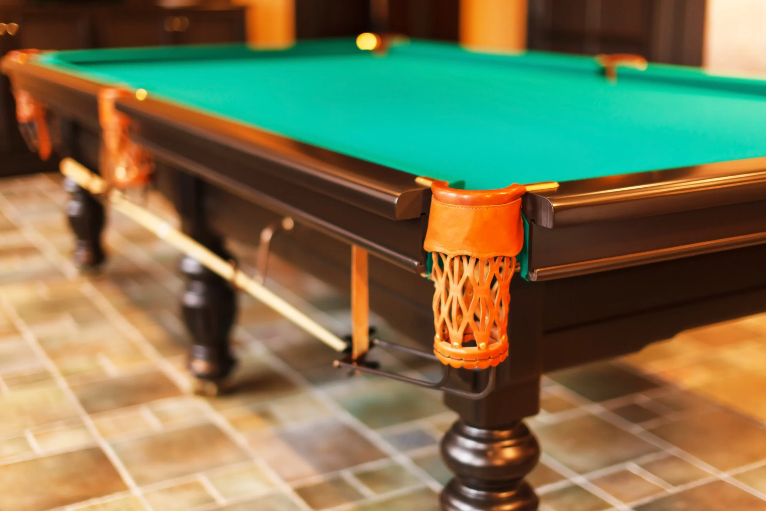 Why do Billiards Tables Not Have Pockets?